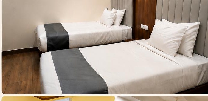 Twin-bed hotel room dressed in V5 linen